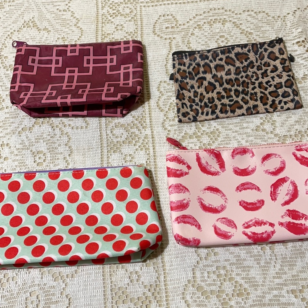 Clinique, Ipsy, and Unknown Cosmetic Bags